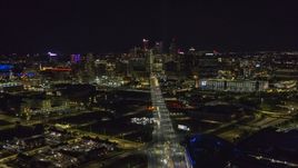A wide view of the city's skyline at night, Downtown Detroit, Michigan Aerial Stock Photos | DXP002_193_0011