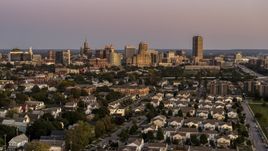 A wide view of the city's skyline at twilight, Downtown Buffalo, New York Aerial Stock Photos | DXP002_204_0015