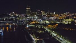 The skyline seen from the river at night, Downtown Buffalo, New York Aerial Stock Photos | DXP002_205_0003