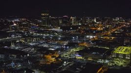 The skyline near arena parking lots at night, Downtown Buffalo, New York Aerial Stock Photos | DXP002_205_0004