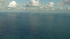 HD aerial stock footage of a view of the open water beneath low clouds, Gulf of Mexico Aerial Stock Footage | AF0001_000188