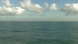 HD aerial stock footage fly low over the Gulf of Mexico and approach the coast, Matagorda Peninsula, Texas Aerial Stock Footage | AF0001_000196