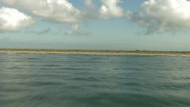 HD aerial stock footage fly low over the Gulf of Mexico and the Matagorda Peninsula, Texas Aerial Stock Footage | AF0001_000197