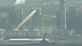 HD aerial stock footage pan across structures at the WA Parish Generating Station at Smithers Lake, Texas Aerial Stock Footage | AF0001_000238