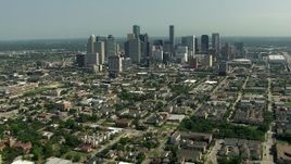 HD aerial stock footage of a view of the city skyline, and zoom to a closer view, Downtown Houston, Texas Aerial Stock Footage | AF0001_000260