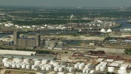 HD aerial stock footage of flyby an oil tanker and refineries around Buffalo Bayou in Harrisburg, Manchester, Texas Aerial Stock Footage | AF0001_000284