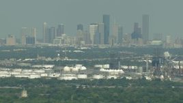 HD aerial stock footage of Downtown Houston skyline seen from oil refineries in Harrisburg, Manchester, Texas Aerial Stock Footage | AF0001_000297