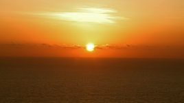 HD aerial stock footage of a bright sunrise over the Gulf of Mexico Aerial Stock Footage | AF0001_000342
