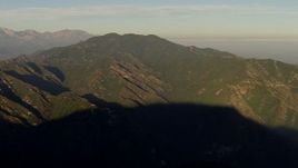 HD aerial stock footage pan across a peak in the San Gabriel Mountains, California, sunset Aerial Stock Footage | AF0001_000497