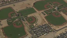 HD aerial stock footage of a bird's eye view of baseball diamonds, reveal Valley Vista High School, Surprise, Arizona Aerial Stock Footage | AF0001_000842