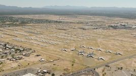 HD aerial stock footage of neat rows of military airplanes at an aircraft boneyard, Davis Monthan AFB, Tucson, Arizona Aerial Stock Footage | AF0001_000858