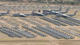 HD aerial stock footage of military airplanes of various sizes at the base's aircraft boneyard, Davis Monthan AFB, Tucson, Arizona Aerial Stock Footage | AF0001_000863