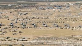 HD aerial stock footage of airplanes at the base's aircraft boneyard, Davis Monthan AFB, Tucson, Arizona Aerial Stock Footage | AF0001_000866