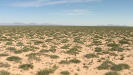 HD aerial stock footage of a wide plain with desert vegetation in New Mexico Aerial Stock Footage | AF0001_000902