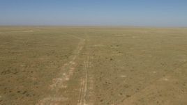 HD aerial stock footage of flying over an arid plain near El Paso, Texas Aerial Stock Footage | AF0001_000966