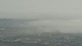 5K aerial stock footage of low fog over suburban homes in Los Angeles, California Aerial Stock Footage | AF0001_000975