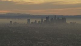 5K aerial stock footage of the Downtown Los Angeles skyline at a hazy sunset, California Aerial Stock Footage | AF0001_000984