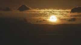 8K aerial stock footage of the sun setting behind clouds in Northern California Aerial Stock Footage | AF0001_001041