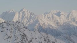 4K aerial stock footage revealing snow covered Chugach Mountain peaks, Chugach National Forest, Alaska Aerial Stock Footage | AK0001_0006