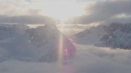 4K aerial stock footage snow-covered peaks, clouds, Chugach Mountains, Chugach National Forest, Alaska Aerial Stock Footage | AK0001_0011