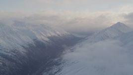 4K aerial stock footage approaching a valley between Chugach Mountains, Chugach National Forest, Alaska Aerial Stock Footage | AK0001_0014