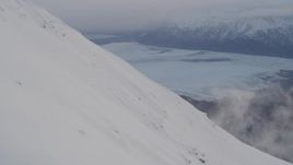 4K aerial stock footage snowy slope, Knik Glacier, Inner Lake George, Chugach National Forest, Alaska Aerial Stock Footage | AK0001_0022