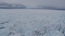 4K aerial stock footage flying low over surface of Knik Glacier, Alaska Aerial Stock Footage | AK0001_0033