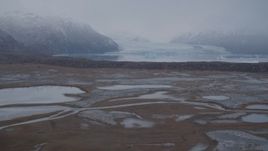 4K aerial stock footage flying low, approaching Inner Lake George and a glacier, Inner Lake George, Alaska Aerial Stock Footage | AK0001_0037
