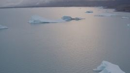 4K aerial stock footage flying over icebergs on Inner Lake George, tilt down, Inner Lake George, Alaska Aerial Stock Footage | AK0001_0041