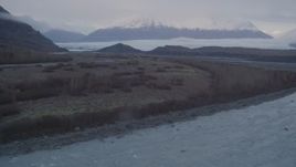 4K aerial stock footage approaching glacier, distant snow covered mountains, Knik, Alaska Aerial Stock Footage | AK0001_0046