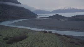 4K aerial stock footage flying low over a river and approaching a glacier, Knik, Alaska Aerial Stock Footage | AK0001_0047