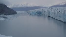 4K aerial stock footage flying low over a lake near the edge of a glacier, Knik, Alaska Aerial Stock Footage | AK0001_0049