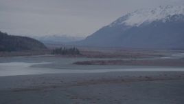 4K aerial stock footage fly over river, foothills, pan to valley, Chugach Mountains, Knik River Valley, Alaska Aerial Stock Footage | AK0001_0062