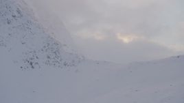4K aerial stock footage reveal snow covered Chugach Mountains, Chugach National Forest, Alaska Aerial Stock Footage | AK0001_0070