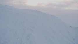 4K aerial stock footage approaching summit of a snowy peak, Chugach Mountains, Alaska Aerial Stock Footage | AK0001_0076