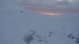 4K aerial stock footage approach snow covered summit, reveal sunset, Chugach Mountains, Alaska, sunset Aerial Stock Footage | AK0001_0090