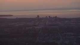 4K aerial stock footage approaching Merrill Field and Downtown Anchorage, Alaska, sunset Aerial Stock Footage | AK0001_0101