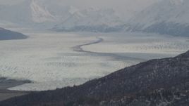 4K aerial stock footage glacier, bordered by Chugach Mountains, Knik Glacier, Alaska Aerial Stock Footage | AK0001_0110