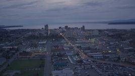 4K aerial stock footage flying by downtown skyline, Downtown Anchorage, Alaska, night Aerial Stock Footage | AK0001_0153