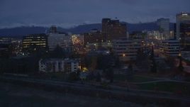 4K aerial stock footage flying along the shore, by Downtown Anchorage, Alaska, night Aerial Stock Footage | AK0001_0155