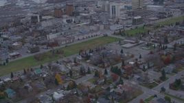 4K aerial stock footage tilt up from neighborhood, revealing downtown buildings, Anchorage, Alaska Aerial Stock Footage | AK0001_0161
