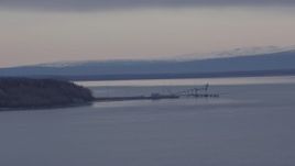 4K aerial stock footage of a dock on the Knik Arm of the Cook Inlet, Point Mackenzie, Alaska Aerial Stock Footage | AK0001_0169