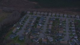 4K aerial stock footage flying over residential neighborhood, reveal countryside, Anchorage, Alaska Aerial Stock Footage | AK0001_0179