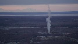 4K aerial stock footage flying by a power plant, Anchorage, Alaska, twilight Aerial Stock Footage | AK0001_0184