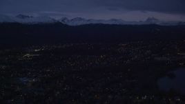 4K aerial stock footage flying by suburban neighborhood, pan left, Anchorage, Alaska, night Aerial Stock Footage | AK0001_0194