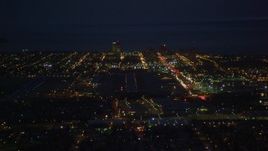 4K aerial stock footage approaching Merrill Field and Downtown Anchorage, Alaska, night Aerial Stock Footage | AK0001_0196
