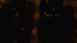 4K aerial stock footage of a bird's eye view of city streets in Downtown Anchorage, Alaska, night Aerial Stock Footage | AK0001_0210