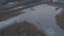 4K aerial stock footage flying over trees bordered by the Knik River, Alaska Aerial Stock Footage | AK0001_0220