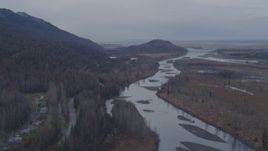 4K aerial stock footage flying by the river running along Old Glenn Highway, Knik River, Alaska Aerial Stock Footage | AK0001_0221
