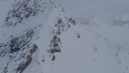 4K aerial stock footage approaching snowy peak, valley, Chugach Mountains, Alaska Aerial Stock Footage | AK0001_0264